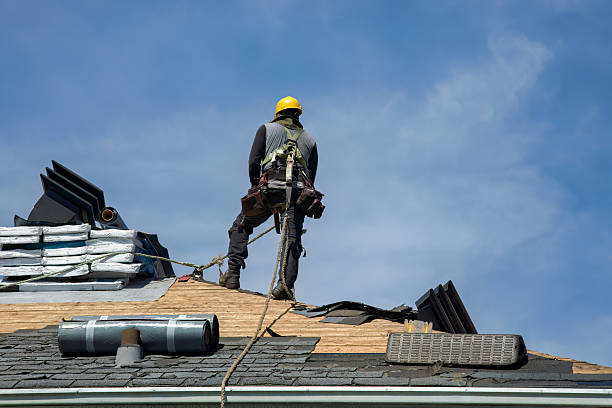 Professional Gutter Installation technician working in Woodville, CA